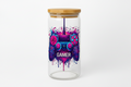 Glass jar with a bamboo lid featuring a colorful gaming controller design and the word 'Gamer'.